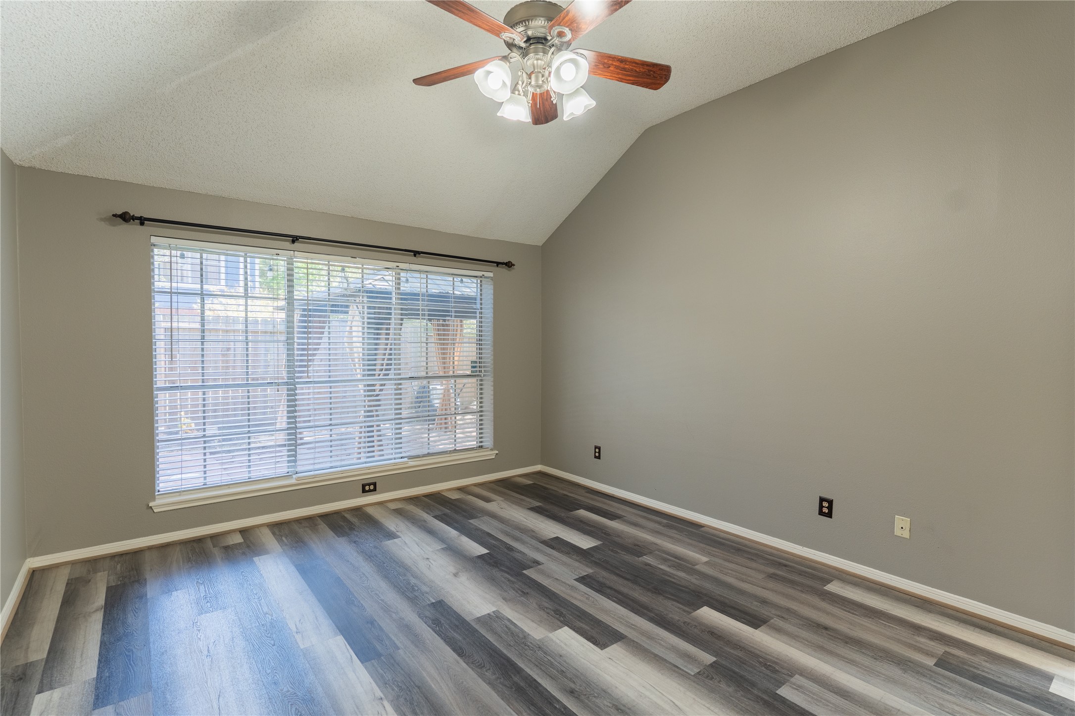 4007 Spring Forest Drive Pearland, TX 77584 - Photo 16 of 39 wooden floor in an empty room with a window