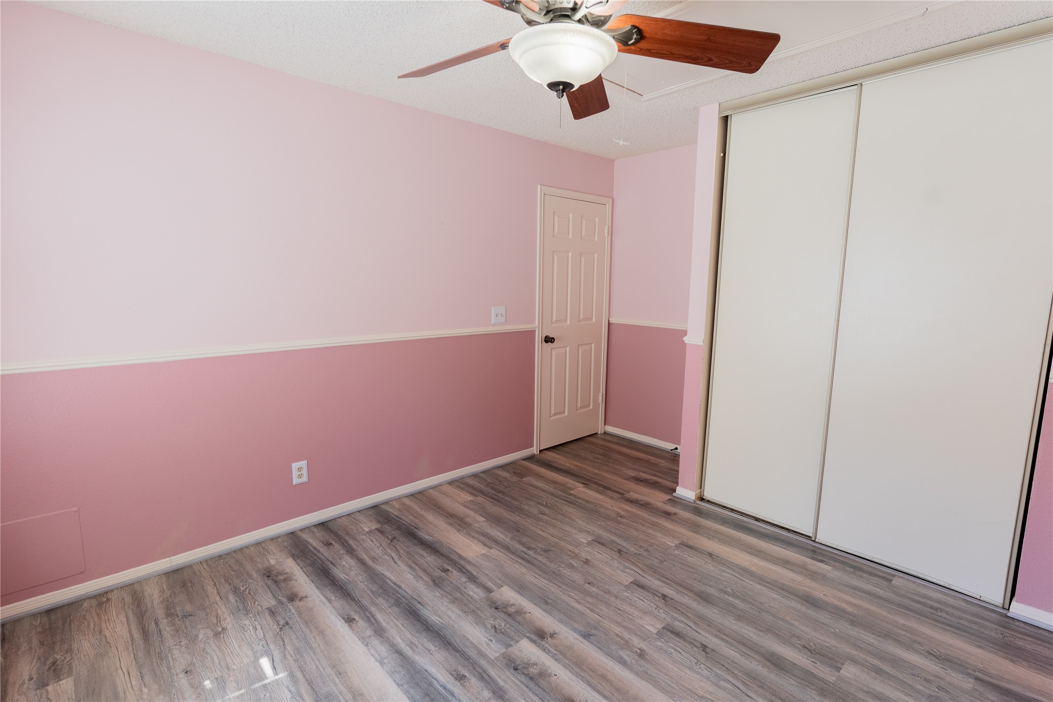 4007 Spring Forest Drive Pearland, TX 77584 - Photo 22 of 39 wooden floor in an empty room