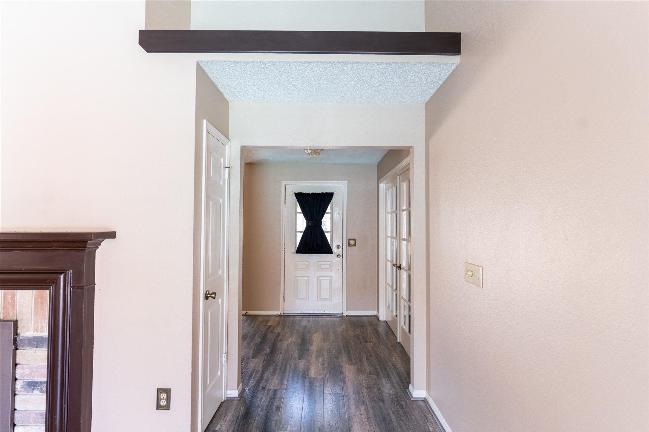 4007 Spring Forest Drive Pearland, TX 77584 - Photo 3 of 39 a view of a hallway with wooden floor