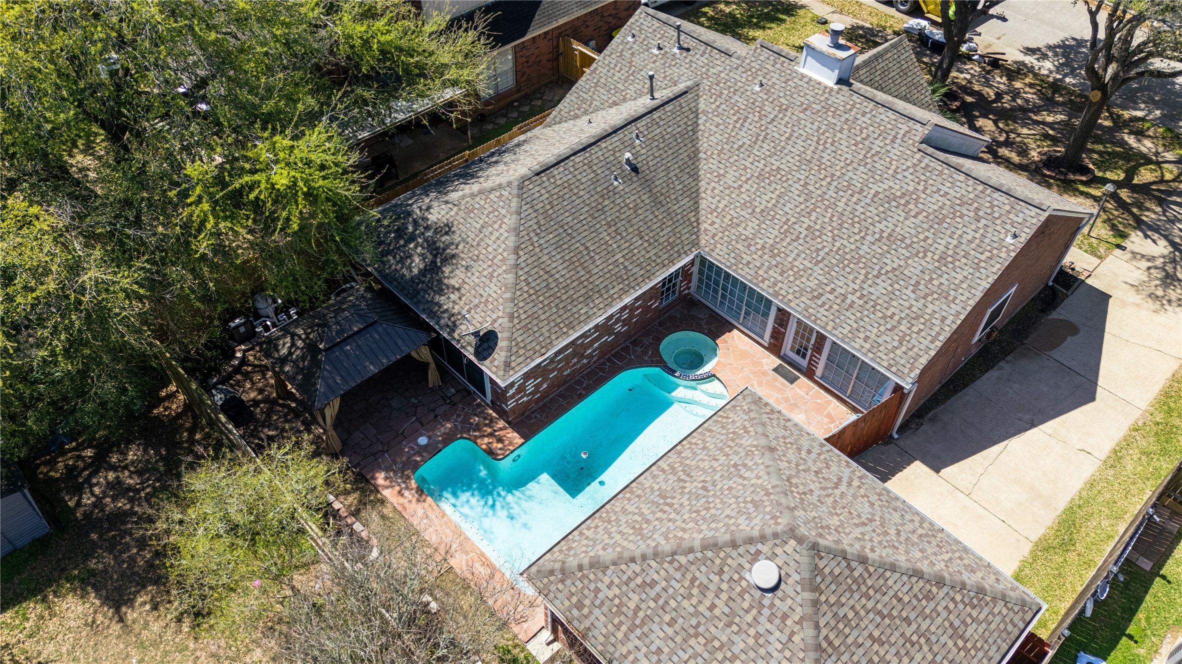 4007 Spring Forest Drive Pearland, TX 77584 - Photo 38 of 39 a view of house with a tree