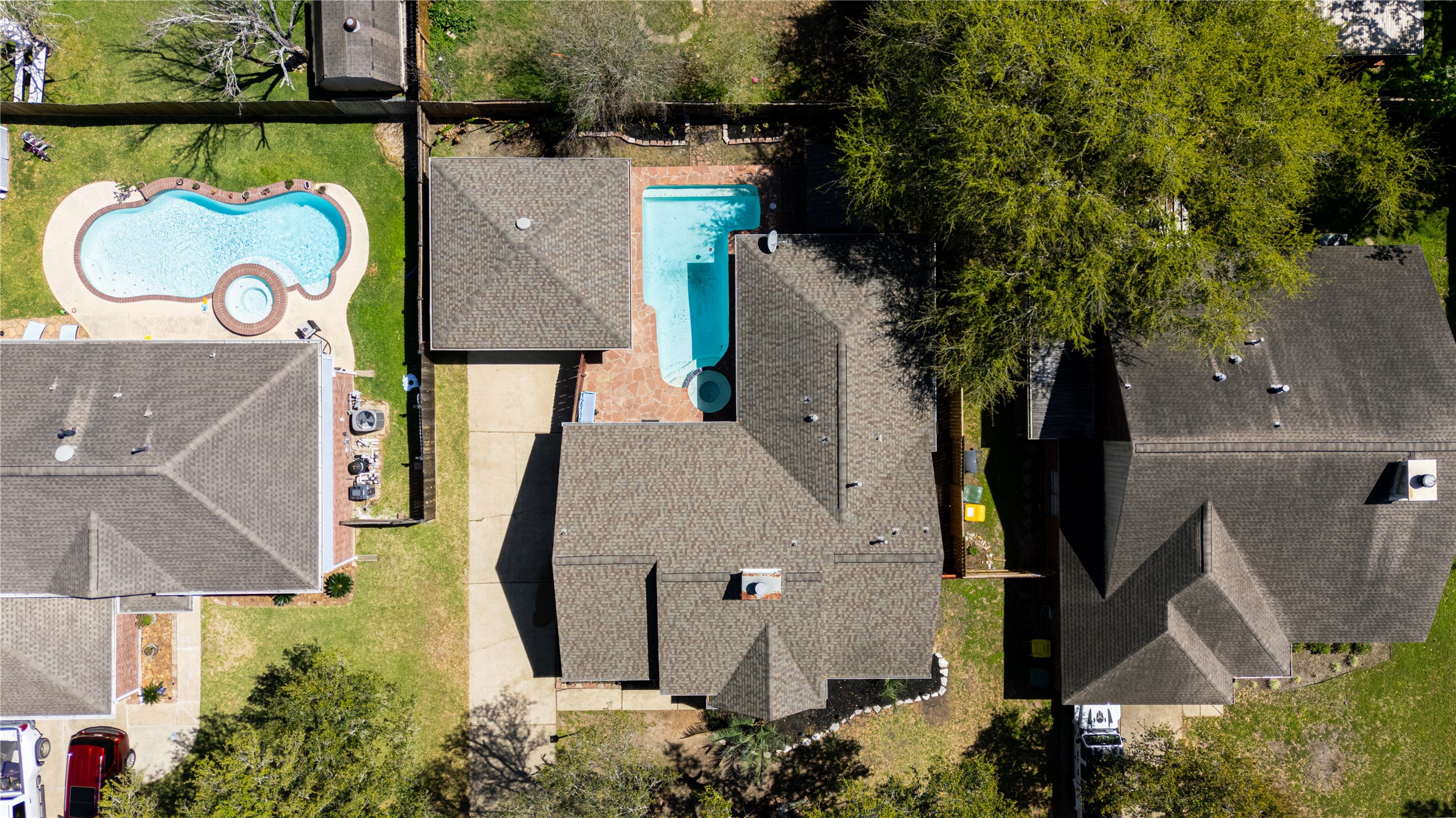 4007 Spring Forest Drive Pearland, TX 77584 - Photo 39 of 39 an aerial view of a house with swimming pool and outdoor space
