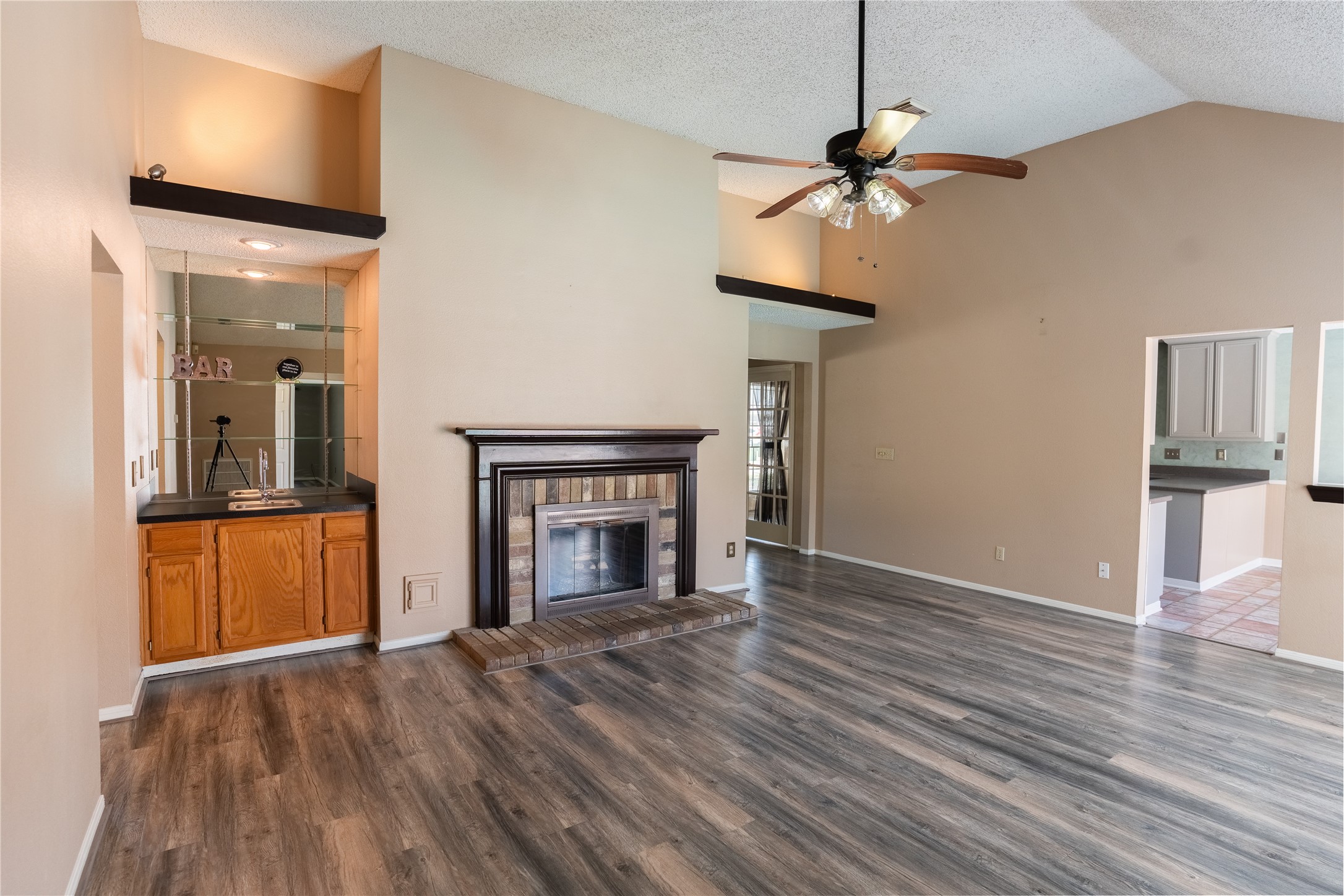 4007 Spring Forest Drive Pearland, TX 77584 - Photo 6 of 39 a view of empty room with wooden floor and fan