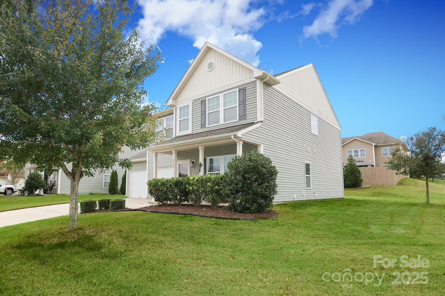 2104 Gillette Drive Clover, SC 29710 - Photo 2 of 33 a front view of house with yard and green space