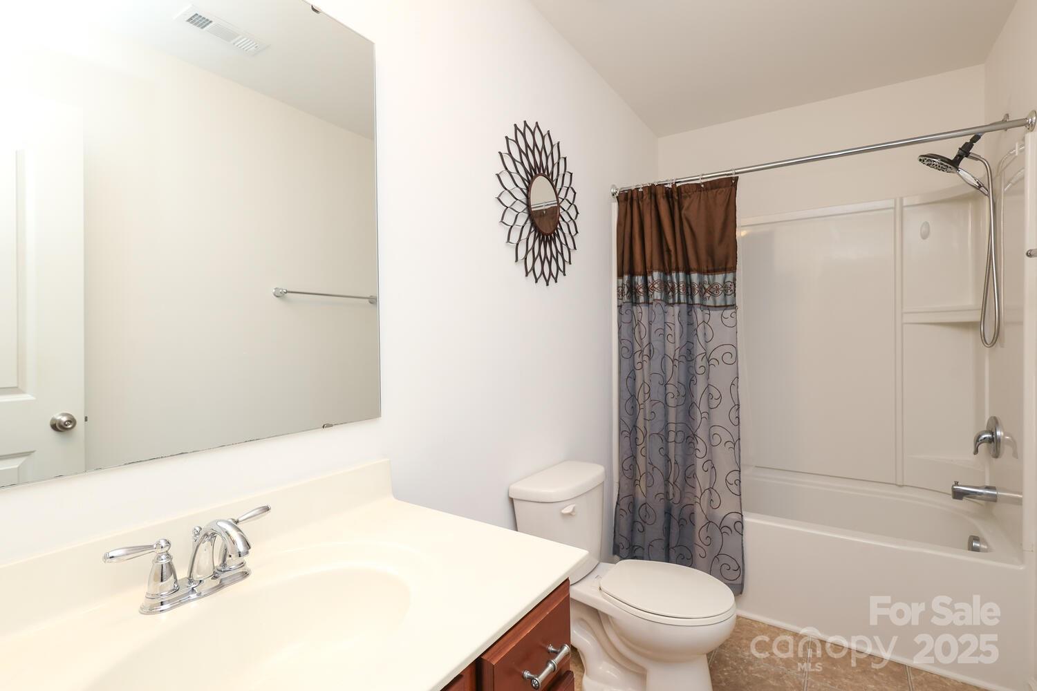 2104 Gillette Drive Clover, SC 29710 - Photo 28 of 33 a bathroom with a sink a toilet and shower