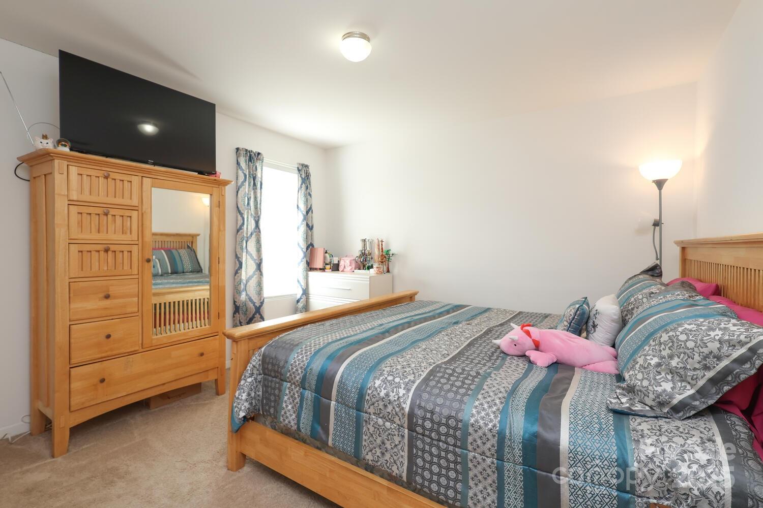 2104 Gillette Drive Clover, SC 29710 - Photo 29 of 33 a bedroom with a bed and a dresser