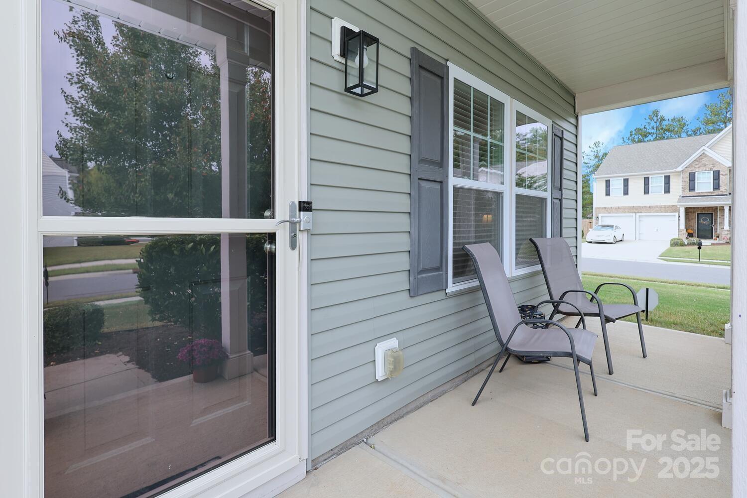 2104 Gillette Drive Clover, SC 29710 - Photo 3 of 33 a balcony with table and chairs