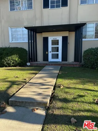 a view of a house with swimming pool