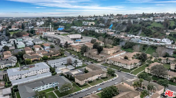 an aerial view of a city with lots of residential buildings