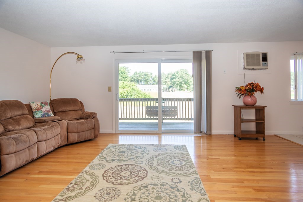 7 Susan Road, Unit 4 Wareham, MA 02532 - Photo 10 of 26 a living room with furniture and a rug