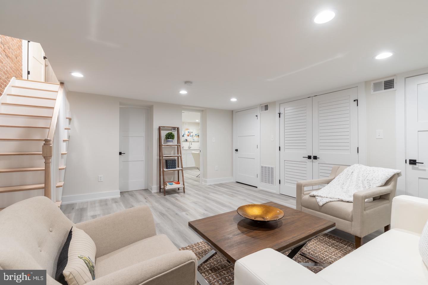 3525 16th Street Northwest Washington, DC 20010 - Photo 34 of 38 a living room with furniture and a table
