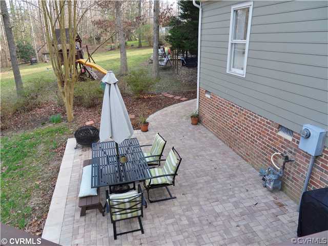 5425 Standing Oak Road Midlothian, VA 23112 - Photo 18 of 18 a view of backyard with deck and outdoor seating