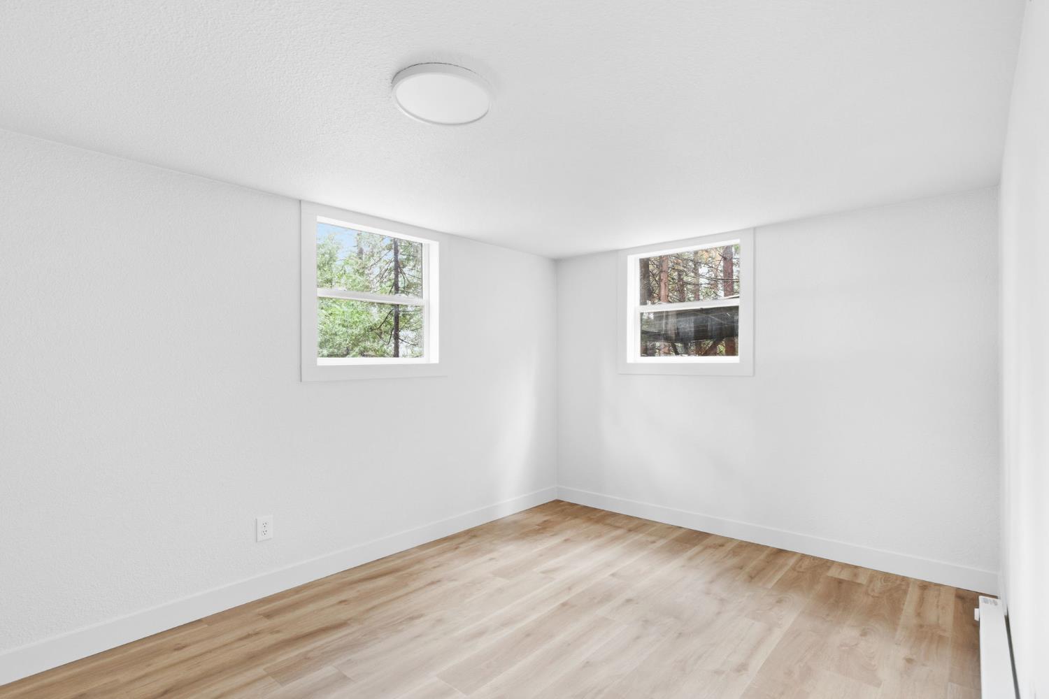 19159 Allan Road Volcano, CA 95689 - Photo 13 of 27 an empty room with a window