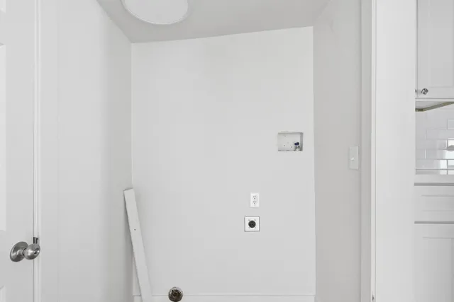 a view of a wooden deck and a forest