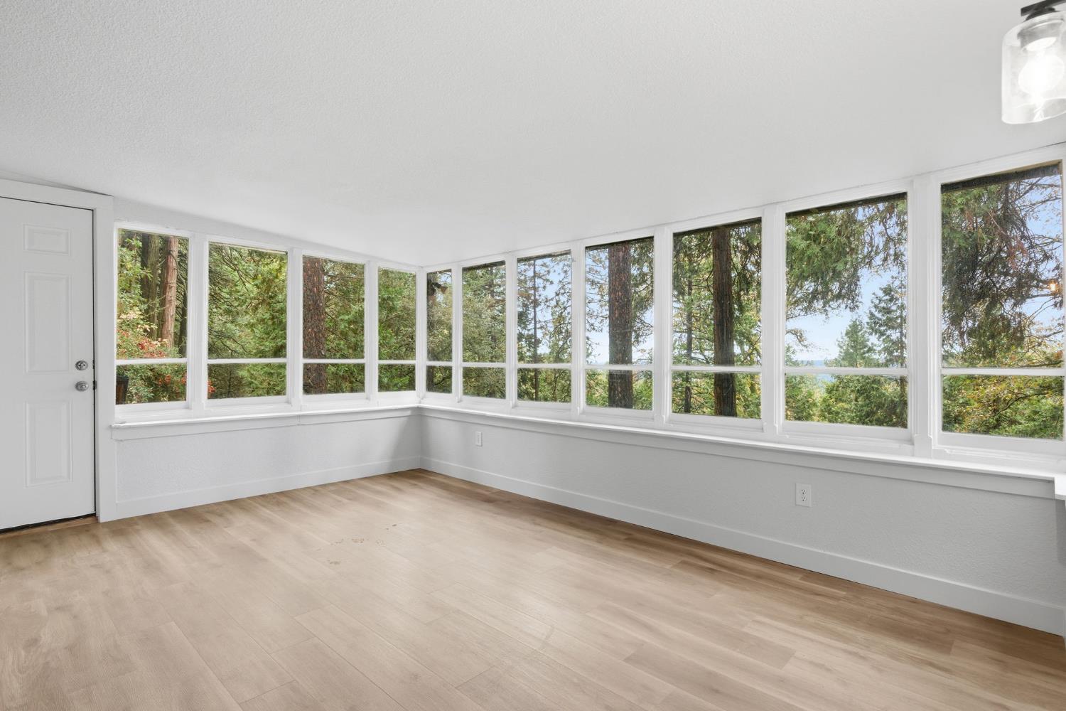 19159 Allan Road Volcano, CA 95689 - Photo 7 of 27 a view of an empty room with a large window