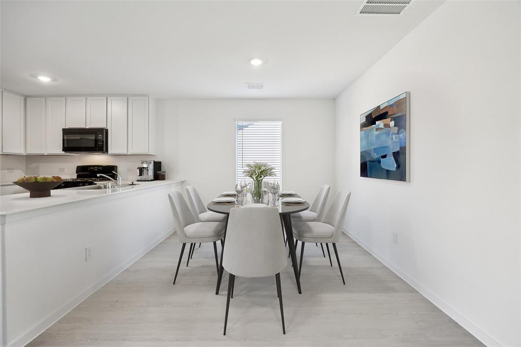 11550 Gammon Avenue Rhome, TX 76078 - Photo 12 of 29 a view of a dining room with furniture