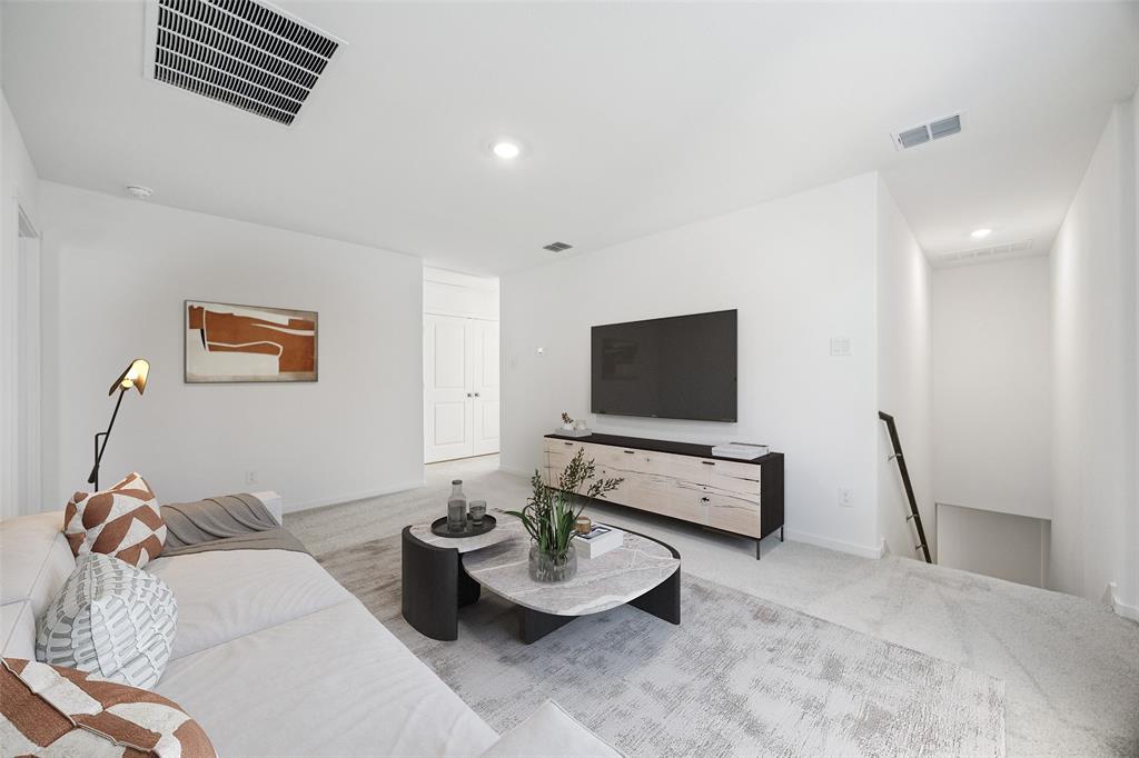 11550 Gammon Avenue Rhome, TX 76078 - Photo 15 of 29 a living room with furniture and a flat screen tv