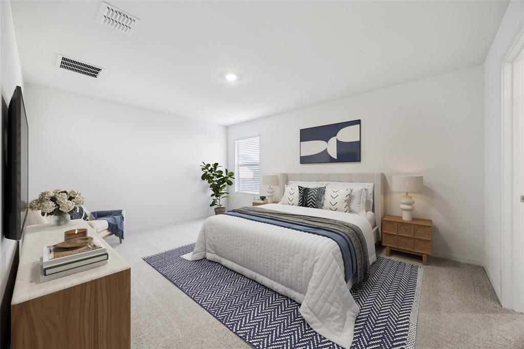 11550 Gammon Avenue Rhome, TX 76078 - Photo 17 of 29 a bedroom with a bed and a couch