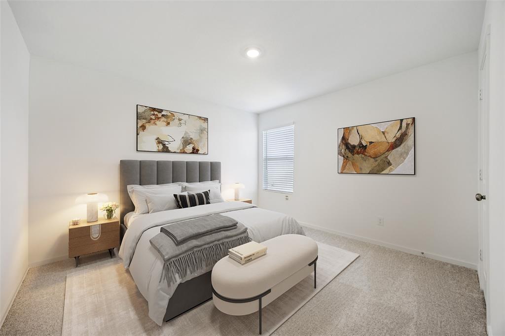 11550 Gammon Avenue Rhome, TX 76078 - Photo 22 of 29 a bedroom with a bed and a couch