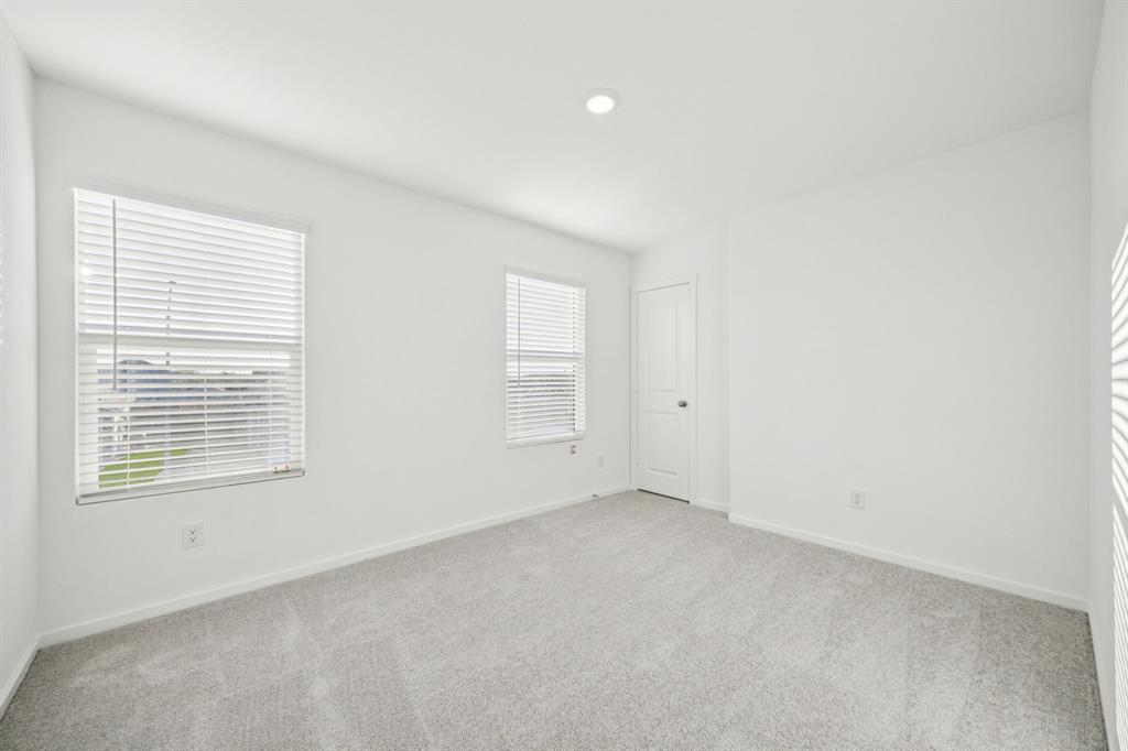 11550 Gammon Avenue Rhome, TX 76078 - Photo 24 of 29 an empty room with a window