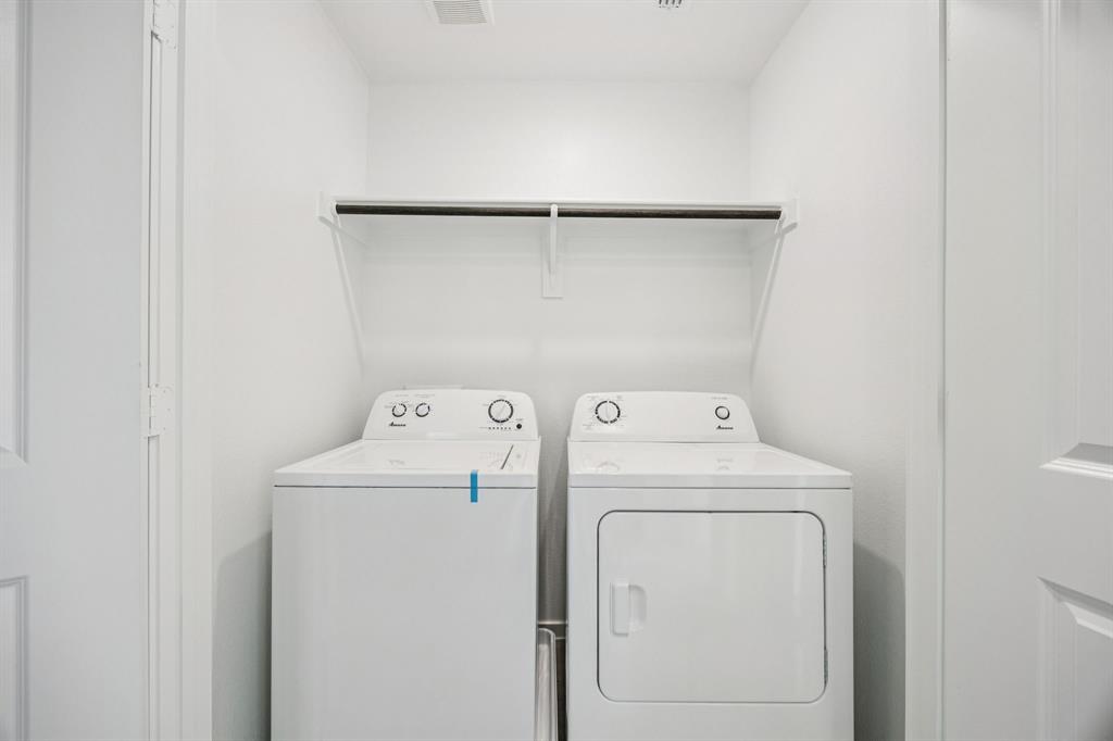 11550 Gammon Avenue Rhome, TX 76078 - Photo 26 of 29 a utility room with dryer and washer