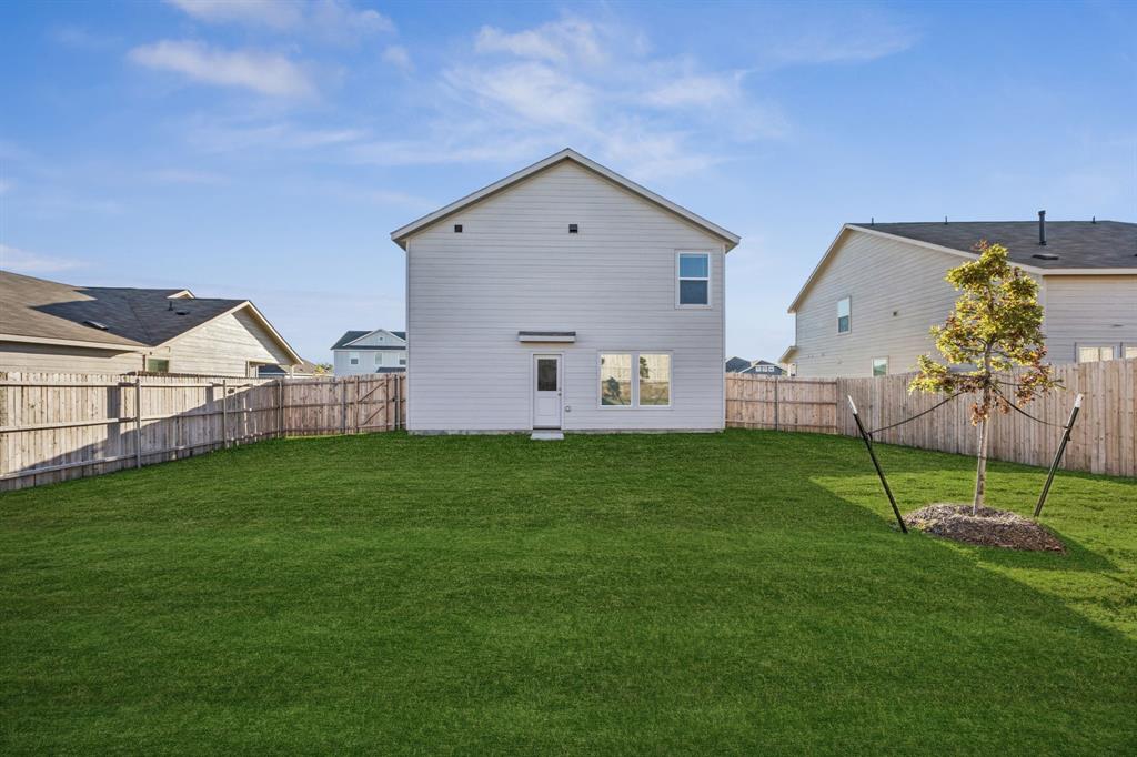 11550 Gammon Avenue Rhome, TX 76078 - Photo 28 of 29 a view of backyard with table and chairs