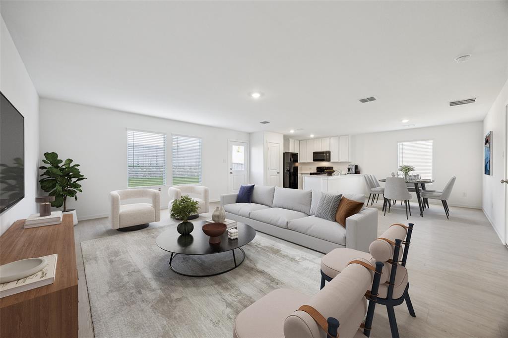 11550 Gammon Avenue Rhome, TX 76078 - Photo 6 of 29 a living room with furniture and a large window