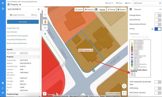 a view of a house with a yard and street