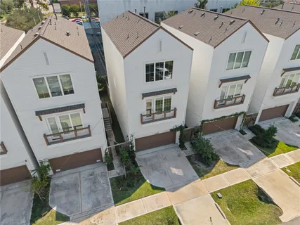 a aerial view of a house with entertaining space