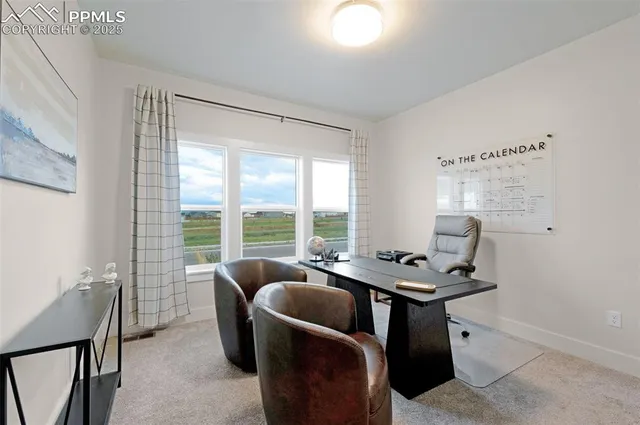 a room with furniture and a window