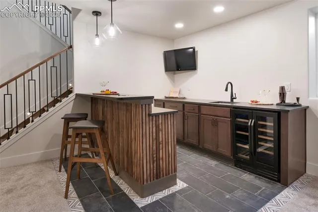 a view of a workspace with furniture