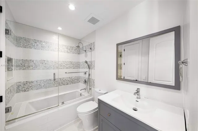 a view of a house with a backyard space and sitting area