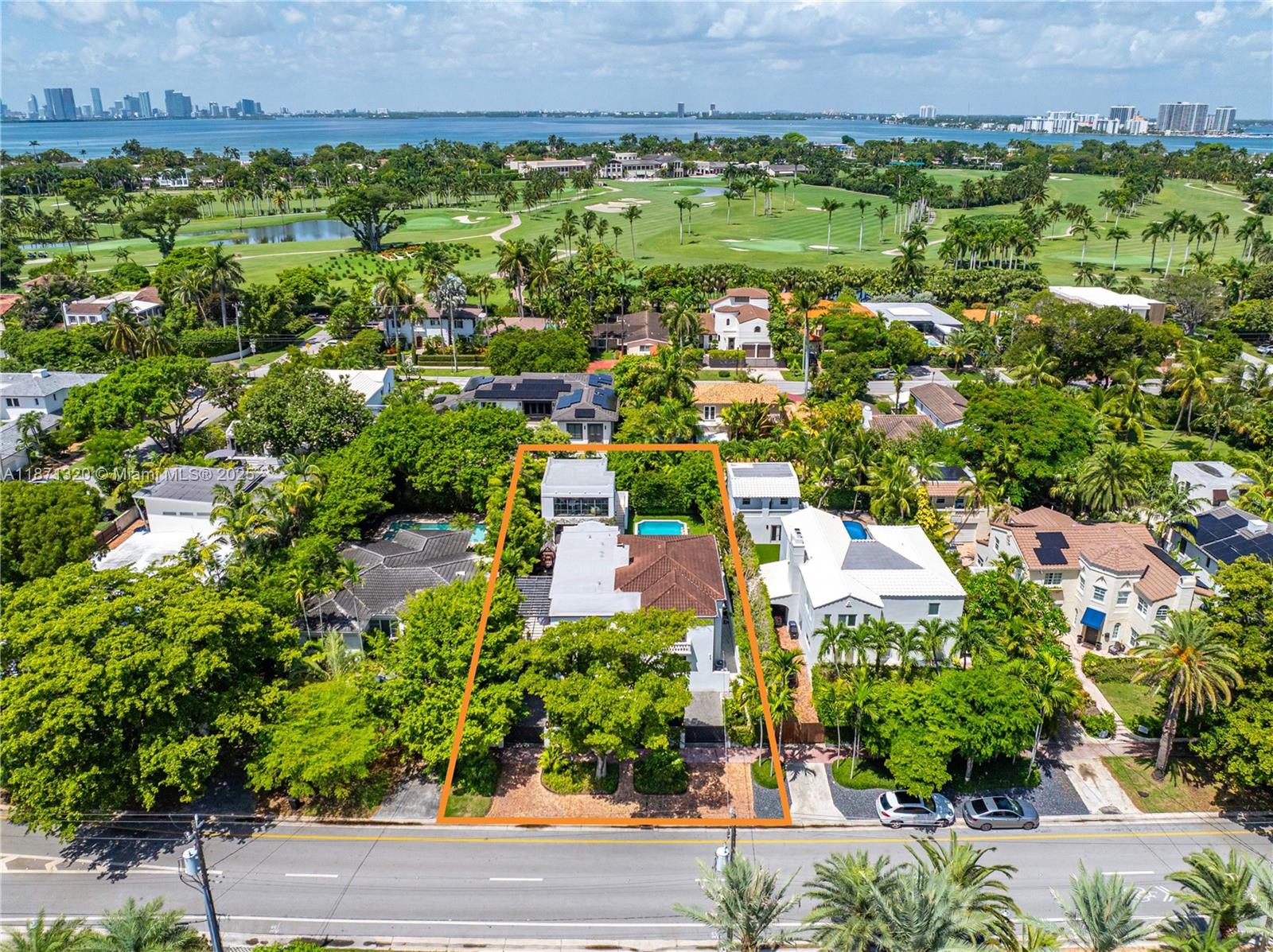 5728 Pine Tree Drive Miami Beach, FL 33140 - Photo 46 of 49 an aerial view of residential house with outdoor space and trees all around