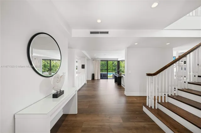a living room with furniture or outdoor view and a large window
