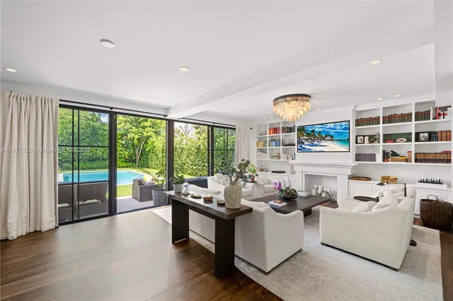 a kitchen with a table and chairs in it