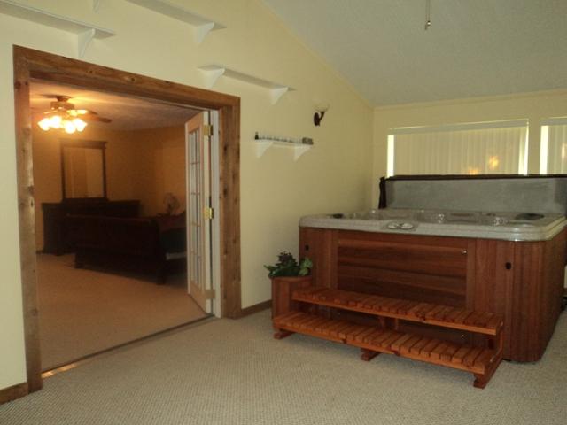 8832 Greer Road Lyles, TN 37098 - Photo 14 of 19 Sunroom off Master with Jacussi.