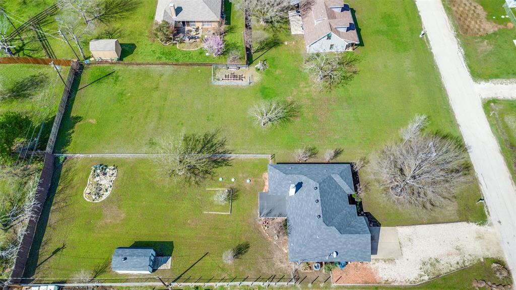 629 Concho Drive Oak Point, TX 75068 - Photo 31 of 35 an aerial view of a house with a yard