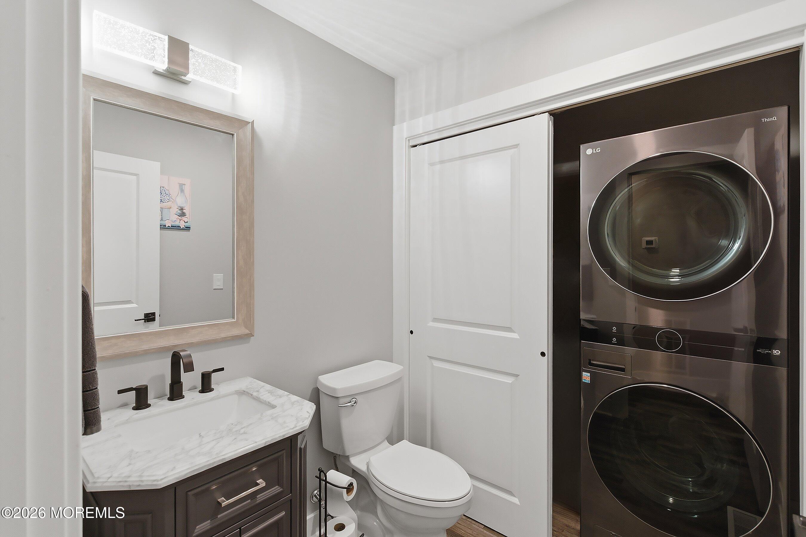 83 Whitesville Road Jackson, NJ 08527 - Photo 11 of 31 a bathroom with a sink a toilet and a mirror