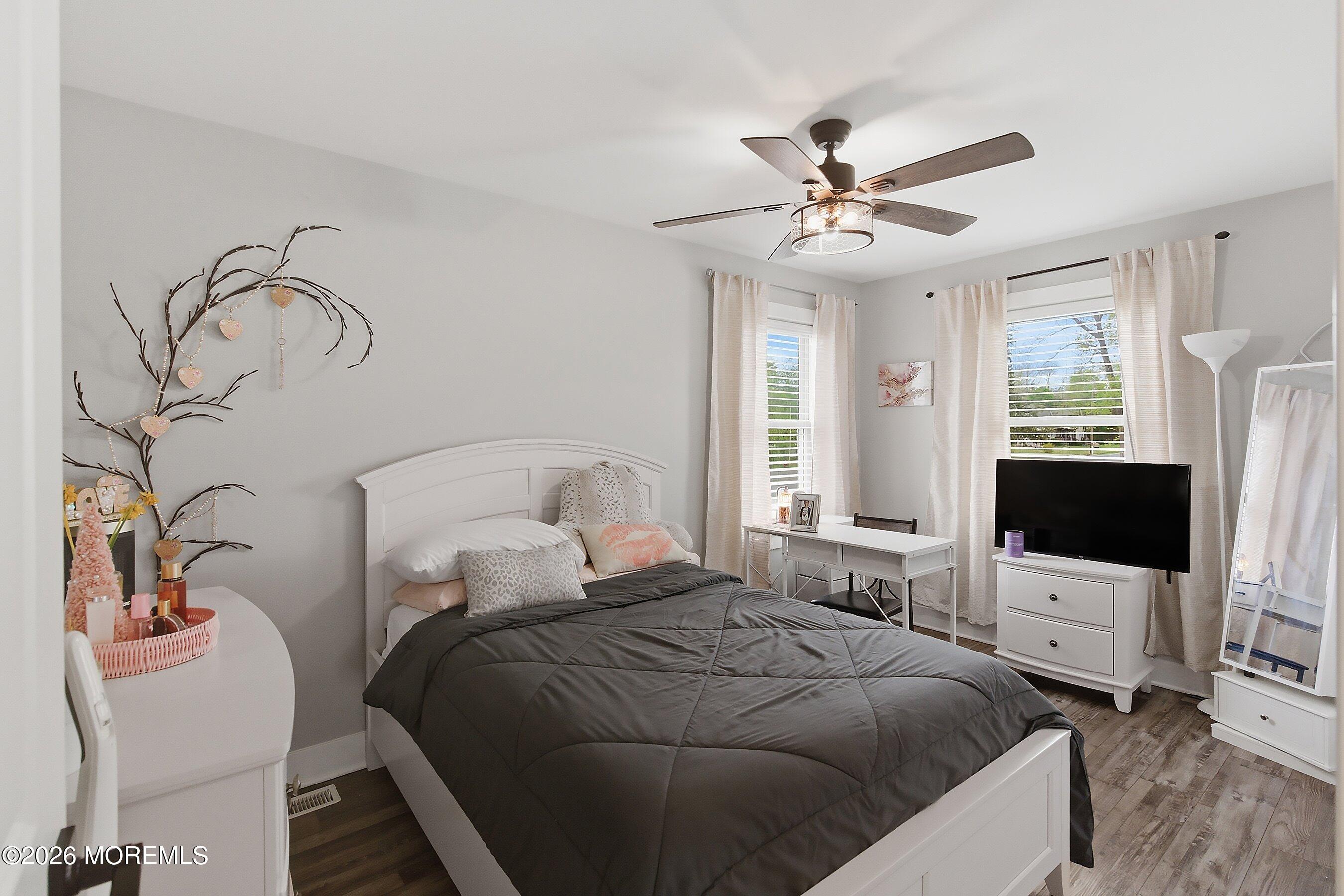 83 Whitesville Road Jackson, NJ 08527 - Photo 12 of 31 a bedroom with a bed and a flat screen tv