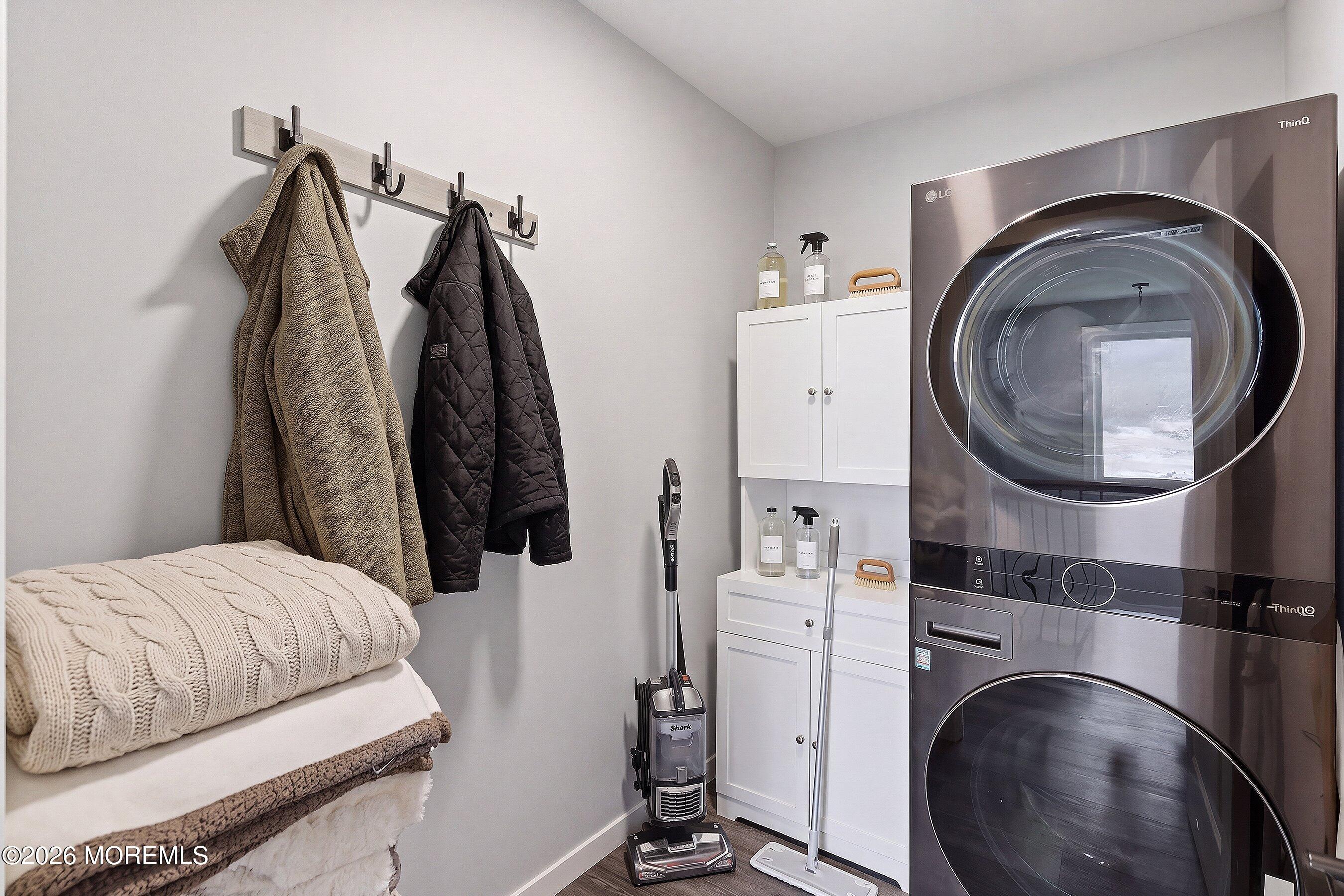 83 Whitesville Road Jackson, NJ 08527 - Photo 25 of 31 a bedroom with a bed and a washing machine in it