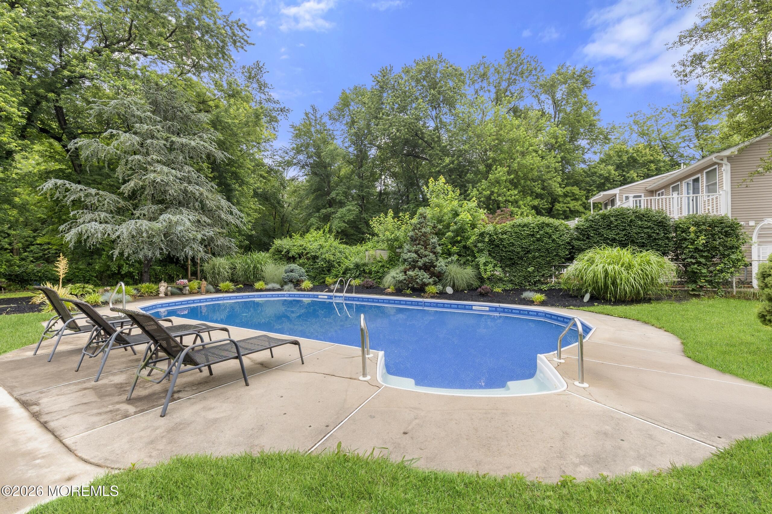 83 Whitesville Road Jackson, NJ 08527 - Photo 29 of 31 a view of backyard with seating area and green space