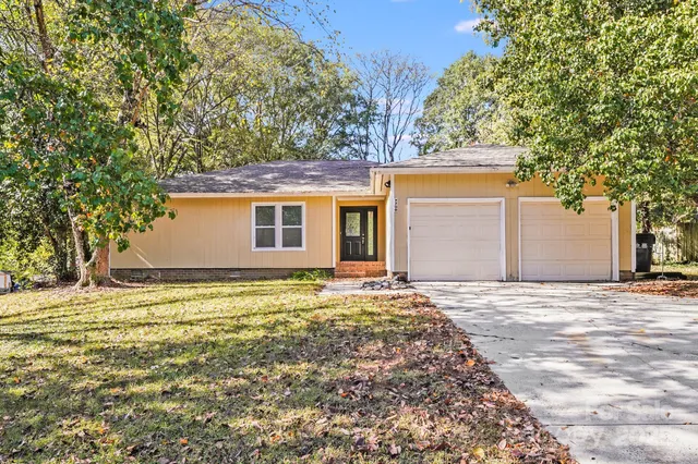 a view of a backyard with a garden