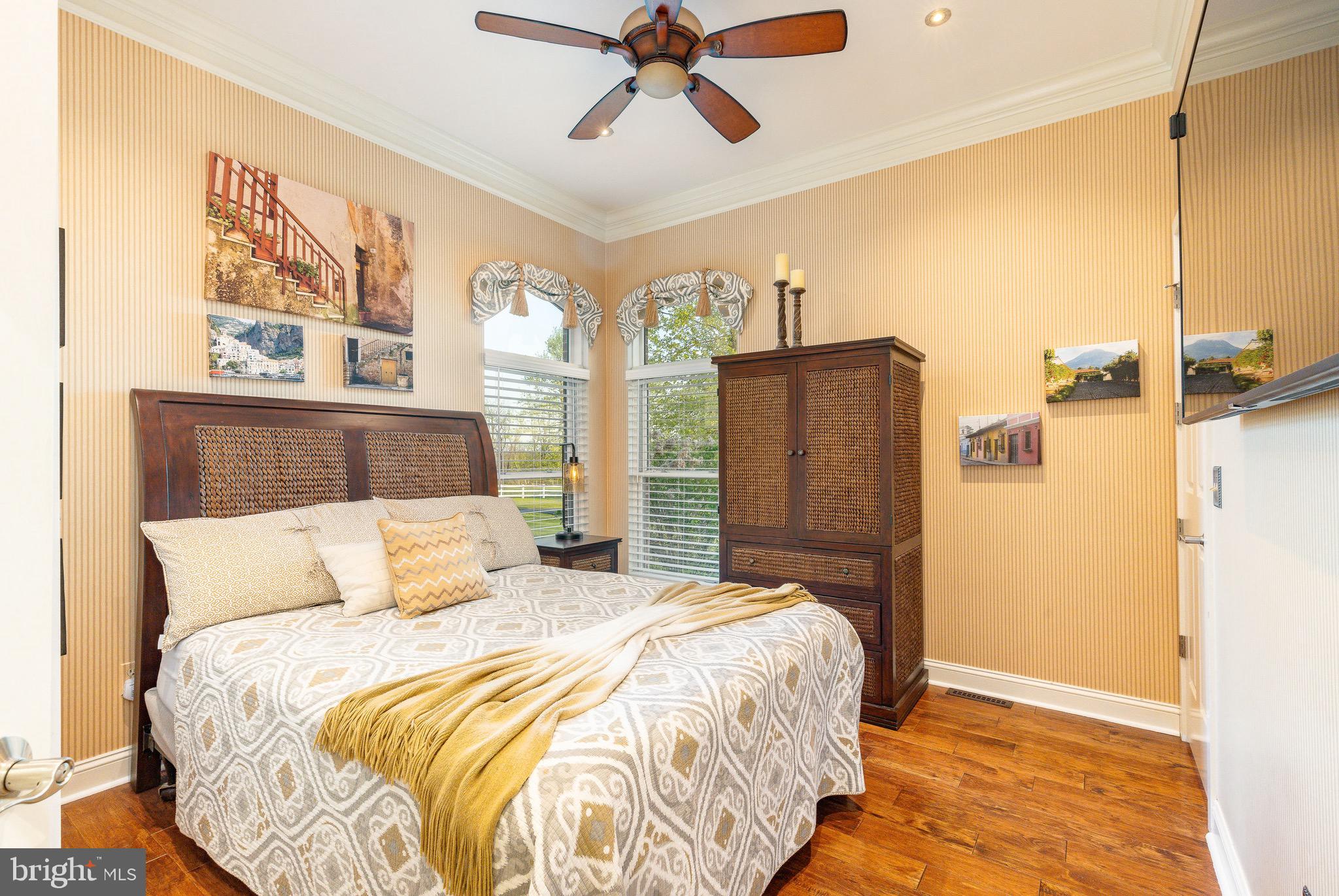127 Fairhill School Road Hatfield, PA 19440 - Photo 30 of 73 a bedroom with a large bed and a chandelier