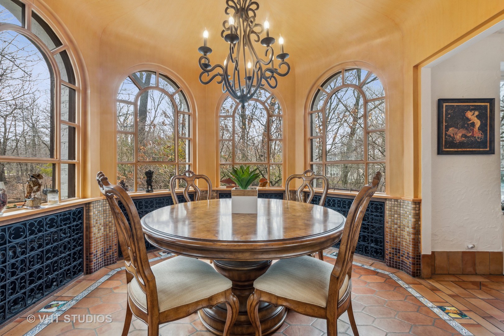 1081 Sheridan Road Highland Park, IL 60035 - Photo 16 of 28 a view of a dining room with furniture large windows and wooden floor