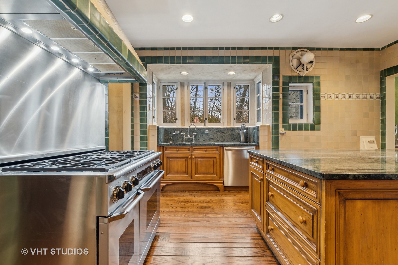 1081 Sheridan Road Highland Park, IL 60035 - Photo 19 of 28 a kitchen with stainless steel appliances granite countertop a stove and a sink