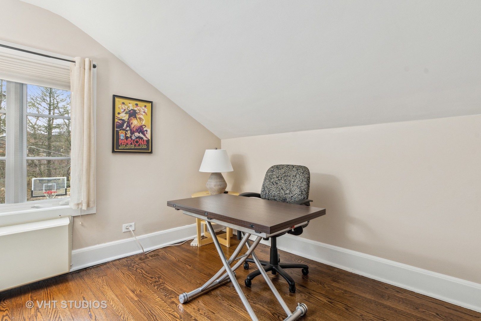 1081 Sheridan Road Highland Park, IL 60035 - Photo 25 of 28 a view of a workspace with furniture and wooden floor