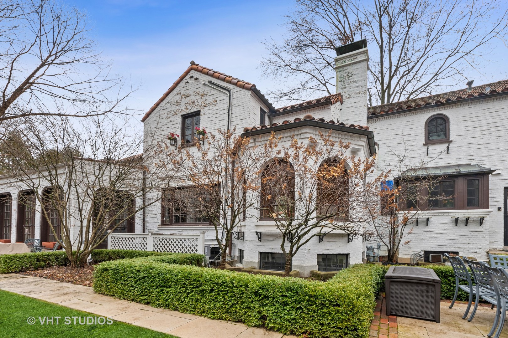 1081 Sheridan Road Highland Park, IL 60035 - Photo 7 of 28 a front view of a building with large trees