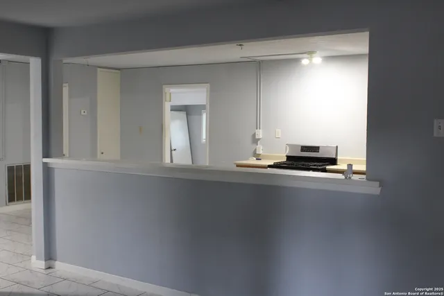 a view of a kitchen from a window