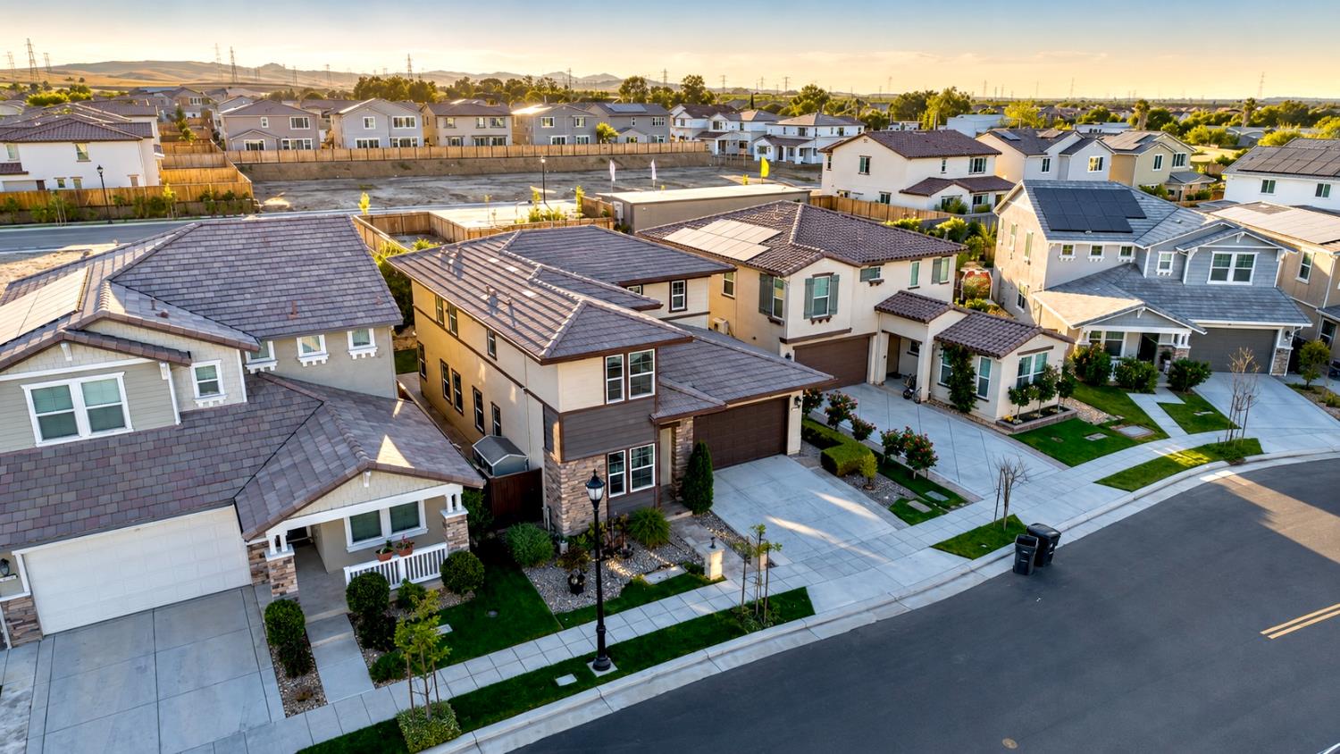 1837 South La Barbera Avenue Mountain House, CA 95391 - Photo 42 of 54 an aerial view of multiple houses with a yard
