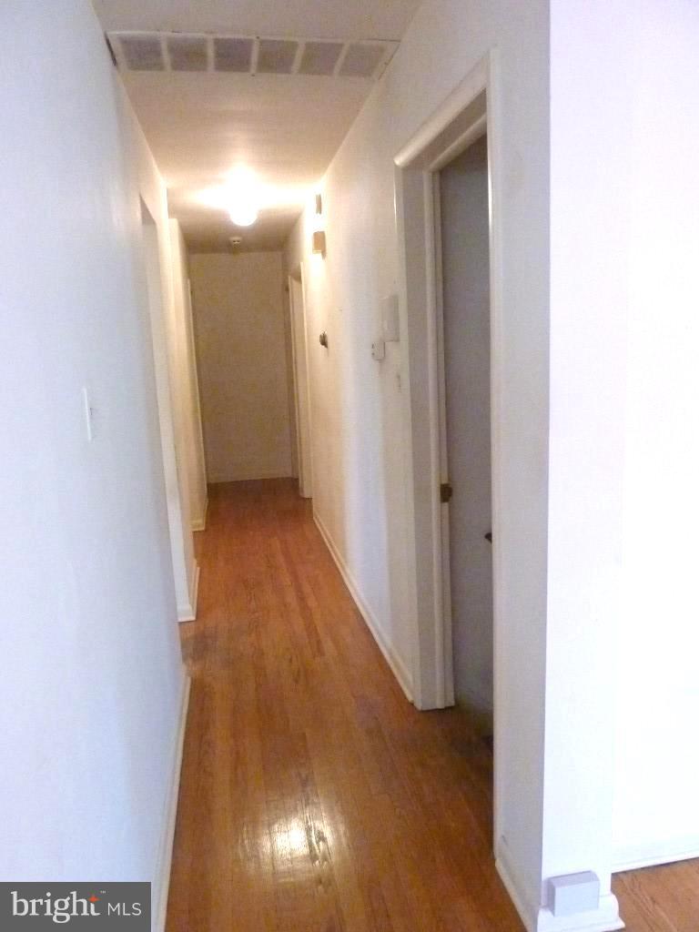 1505 Hamlin Street Northeast Washington, DC 20017 - Photo 12 of 30 a view of a hallway with wooden floor