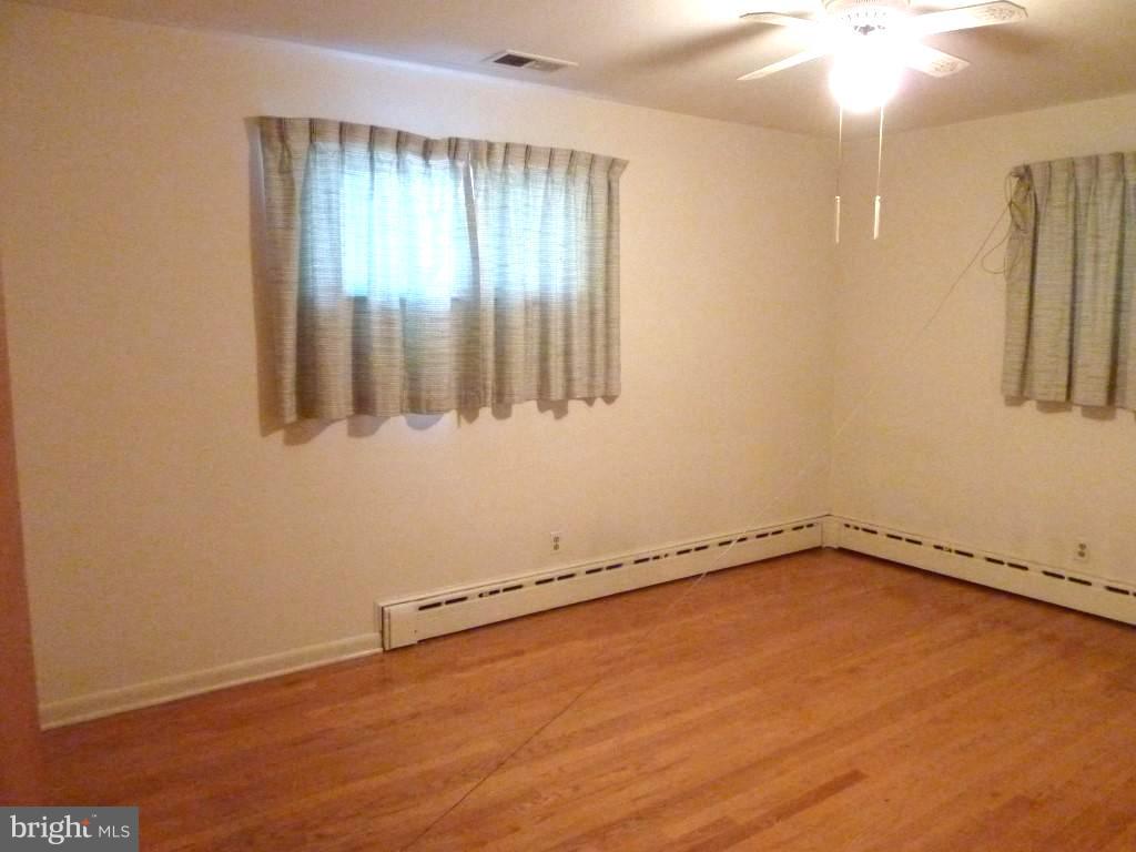 1505 Hamlin Street Northeast Washington, DC 20017 - Photo 15 of 30 an empty room with a window
